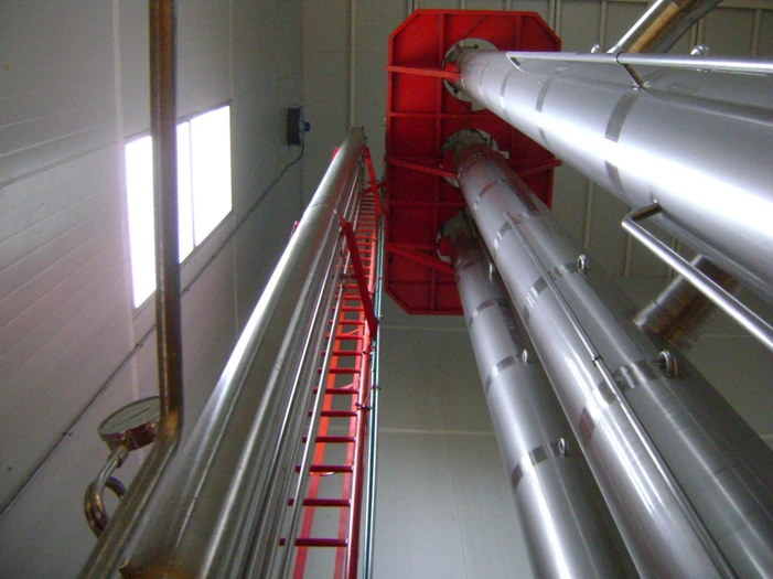 Falling Film evaporator interior — upward view of tubes with red structure